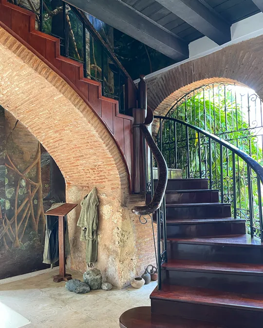 Staircase and brick arches inside the museum, in a restored colonial building