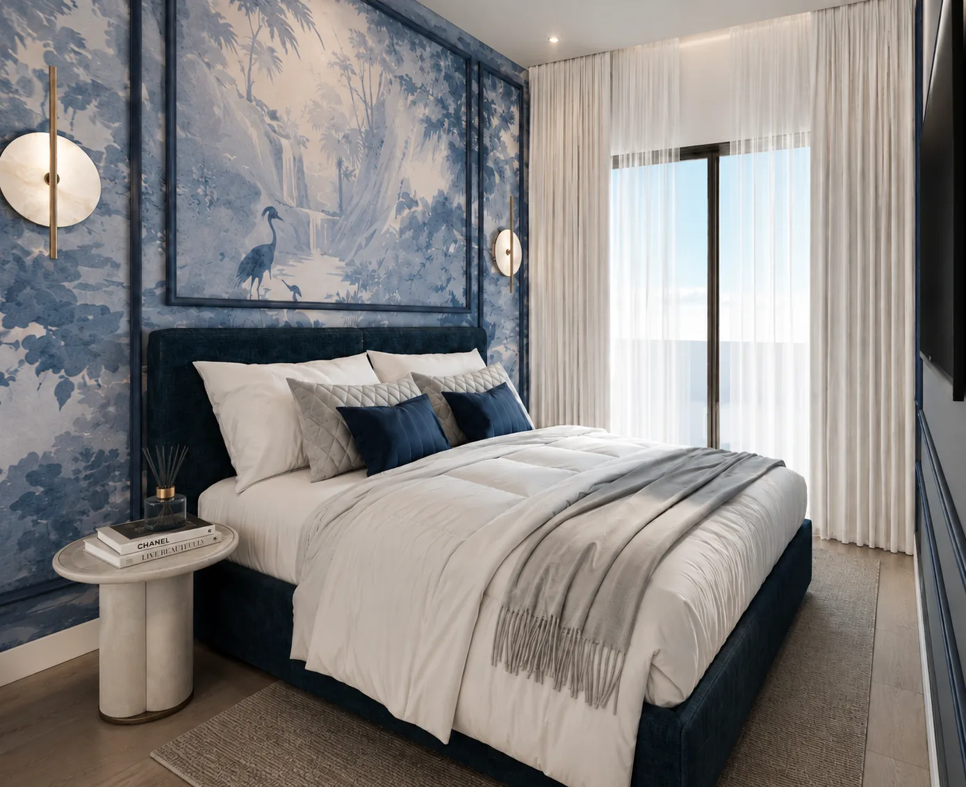 Dormitorio principal con cabecero tapizado y papel decorativo