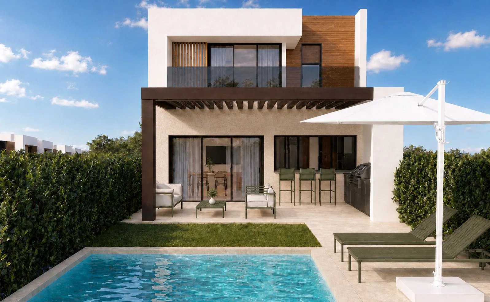 Fachada del townhouse con piscina, pérgola y terraza privada en Punta Cana